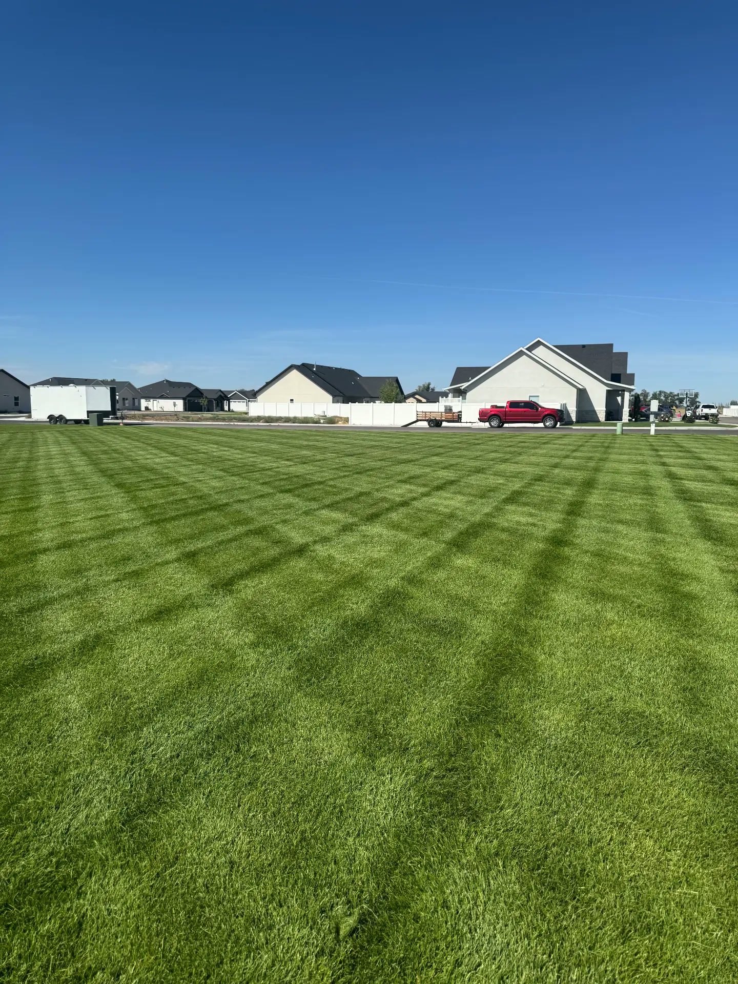 Freshly mowed lawn with clean stripes in Burley, Idaho — R & R Lawncare and Construction